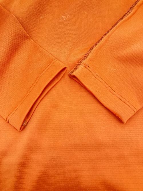 ARC'TERYX（アークテリクス）ARC'TERYX (アークテリクス) ベースレイヤーハーフジップカットソー オレンジ サイズ:Ｍの古着・服飾アイテム