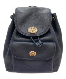 COACH（コーチ）の古着「ターンロックリュック」｜ネイビー