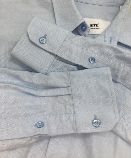 AMI Alexandre Mattiussi（アミアレクサンドルマテュッシ）AMI Alexandre Mattiussi (アミアレクサンドルマテュッシ) SMALL HEART LOGO OXFORD SHIRT/オックスフォードシャツ ライトブルー サイズ:36の古着・服飾アイテム