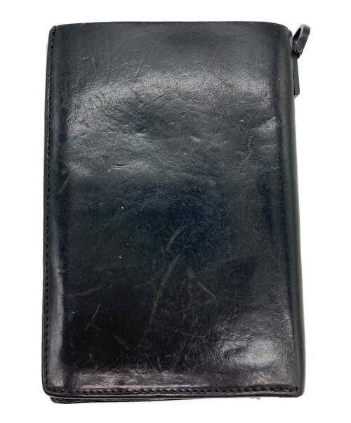 ISAMU KATAYAMA BACKLASH（イサムカタヤマ・バックラッシュ）ISAMU KATAYAMA BACKLASH (イサムカタヤマ・バックラッシュ) 2つ折り財布 ブラックの古着・服飾アイテム