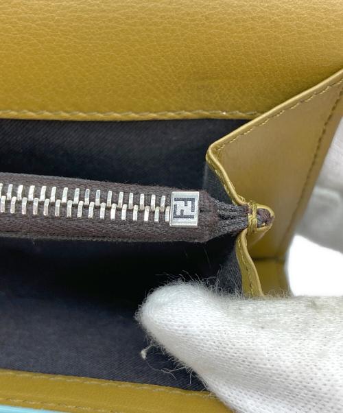FENDI（フェンディ）FENDI (フェンディ) セレリア ピーカブー/ターンロックロングウォレット ネイビー×マスタードの古着・服飾アイテム