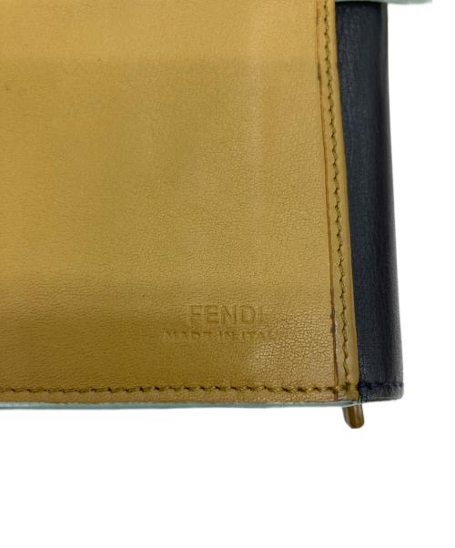 FENDI（フェンディ）FENDI (フェンディ) セレリア ピーカブー/ターンロックロングウォレット ネイビー×マスタードの古着・服飾アイテム