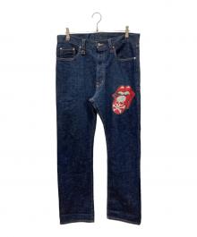 THEATER8×Mastermind JAPAN×THE ROLLING STONES（シアターエイト×マスターマインド ジャパン×ザ ローリングストーンズ）の古着「リップ＆タンプリントコラボデニムパンツ」｜インディゴ