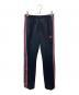 Needles（ニードルズ）の古着「Narrow Track Pant Poly Smooth/トラックパンツ」｜ブラック×ピンク
