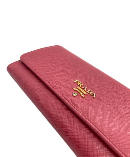 PRADA（プラダ）PRADA (プラダ) ロゴプレートフラップロングウォレット ピンクの古着・服飾アイテム