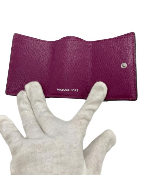 MICHAEL KORS（マイケル・コース）MICHAEL KORS (マイケル・コース) TRIFOLD WLLT パープルの古着・服飾アイテム