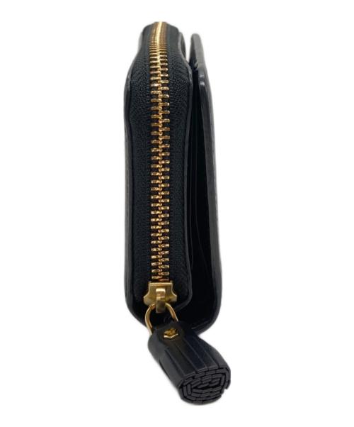 ANYA HINDMARCH（アニヤ・ハインドマーチ）ANYA HINDMARCH (アニヤ・ハインドマーチ) レザー2つ折り財布 ブラックの古着・服飾アイテム