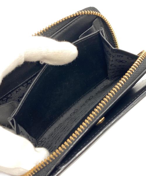 ANYA HINDMARCH（アニヤ・ハインドマーチ）ANYA HINDMARCH (アニヤ・ハインドマーチ) レザー2つ折り財布 ブラックの古着・服飾アイテム