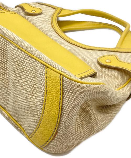 TOD'S（トッズ）TOD'S (トッズ) フラップポケットレザー切替ハンドバッグ イエロー×ベージュの古着・服飾アイテム