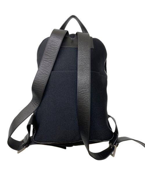 kawa-kawa（カワカワ）kawa-kawa (カワカワ) ear PAPILLONNER (イアパピヨネ) ハトメWETリュック ブラックの古着・服飾アイテム