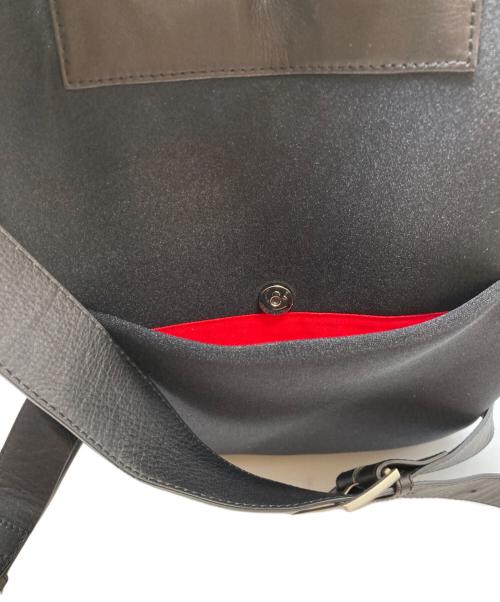 kawa-kawa（カワカワ）kawa-kawa (カワカワ) ear PAPILLONNER (イアパピヨネ) ハトメWETリュック ブラックの古着・服飾アイテム