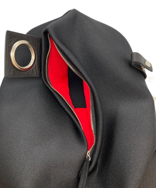 kawa-kawa（カワカワ）kawa-kawa (カワカワ) ear PAPILLONNER (イアパピヨネ) ハトメWETリュック ブラックの古着・服飾アイテム