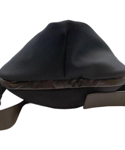 kawa-kawa（カワカワ）kawa-kawa (カワカワ) ear PAPILLONNER (イアパピヨネ) ハトメWETリュック ブラックの古着・服飾アイテム