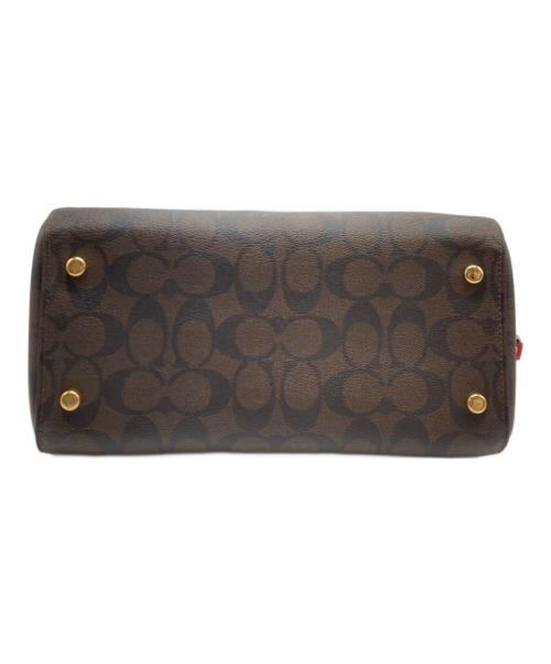 COACH（コーチ）COACH (コーチ) ローアンサッチェルシグネチャー ブラウン×レッドの古着・服飾アイテム