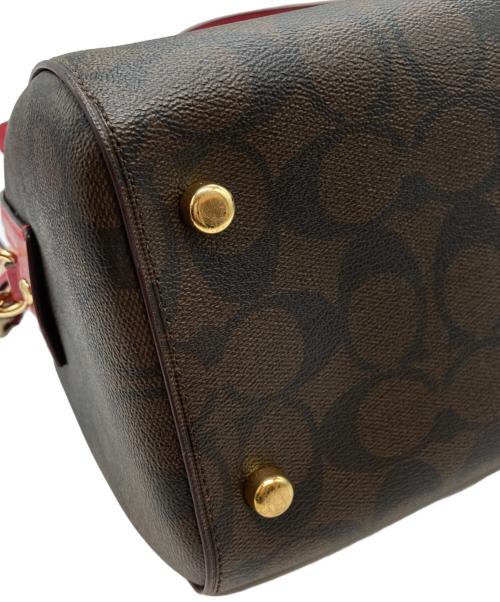 COACH（コーチ）COACH (コーチ) ローアンサッチェルシグネチャー ブラウン×レッドの古着・服飾アイテム
