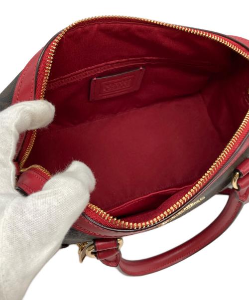 COACH（コーチ）COACH (コーチ) ローアンサッチェルシグネチャー ブラウン×レッドの古着・服飾アイテム