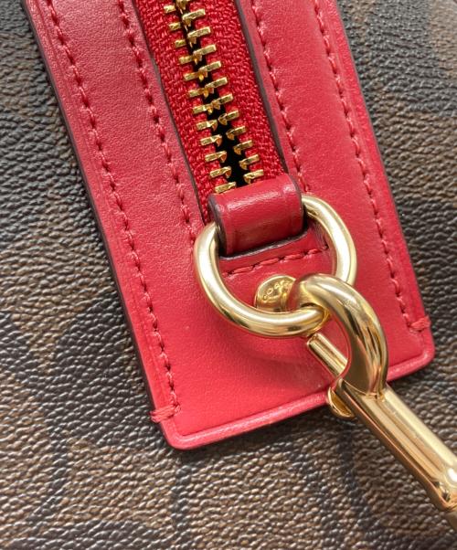 COACH（コーチ）COACH (コーチ) ローアンサッチェルシグネチャー ブラウン×レッドの古着・服飾アイテム