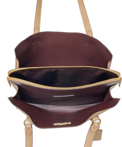 COACH（コーチ）COACH (コーチ) テイタム キャリーオールトートバッグ ベージュの古着・服飾アイテム