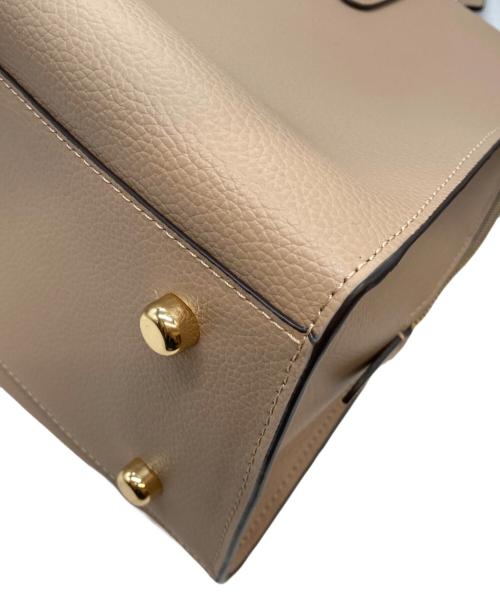 COACH（コーチ）COACH (コーチ) テイタム キャリーオールトートバッグ ベージュの古着・服飾アイテム