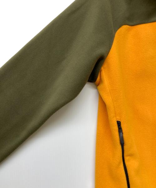 MILLET（ミレー）MILLET (ミレー) ABRASION FLEECE HOODIE カーキ×オレンジ サイズ:Sの古着・服飾アイテム