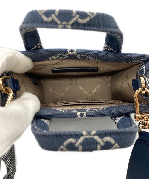 MICHAEL KORS（マイケル・コース）MICHAEL KORS (マイケル・コース) キャンバスショルダーバッグ ネイビー サイズ:-の古着・服飾アイテム