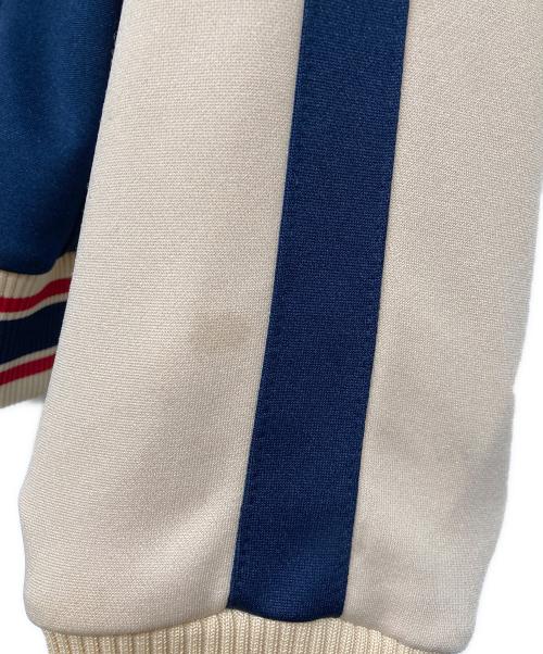 TED COMPANY（テッドカンパニー）TED COMPANY (テッドカンパニー) ジップアップジャージ DEVILS ATTACK ベージュ×ネイビー サイズ:Mの古着・服飾アイテム