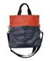 COACH（コーチ）の古着「FOLDOVER TOTE」｜レッド×ネイビー