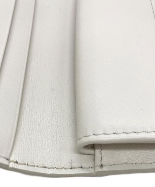 MIU MIU（ミュウミュウ）MIU MIU (ミュウミュウ) クロコ2つ折りコンパクトウォレット イエローの古着・服飾アイテム