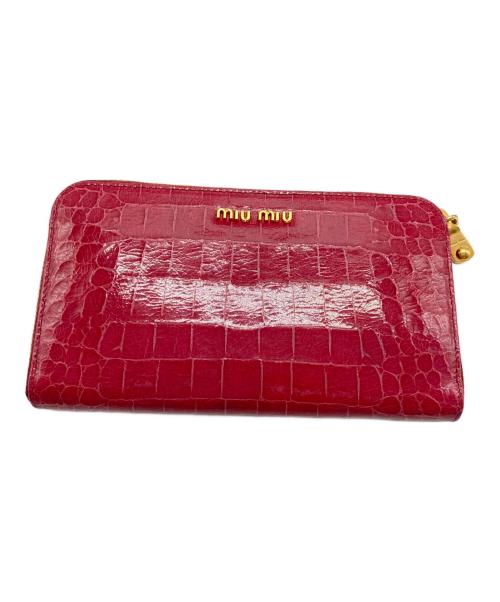 MIU MIU（ミュウミュウ）MIU MIU (ミュウミュウ) クロコ型押しラウンドファスナーウォレット ショッキングピンクの古着・服飾アイテム