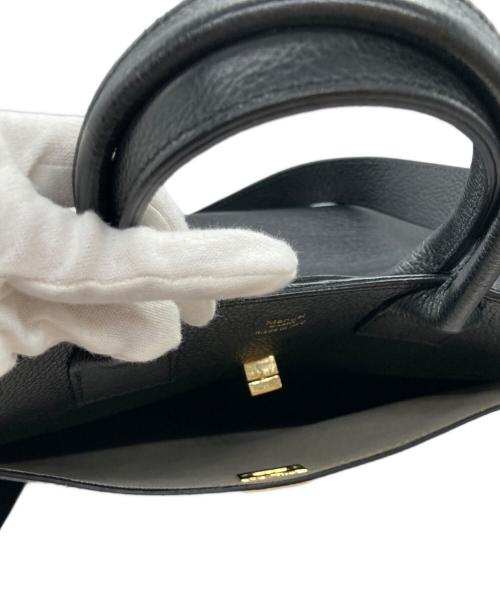 Manuel MILANO（マニュエルミラノ）Manuel MILANO (マニュエルミラノ) IENA (イエナ) 23AW 別注ゴールドモチーフバッグ ブラックの古着・服飾アイテム