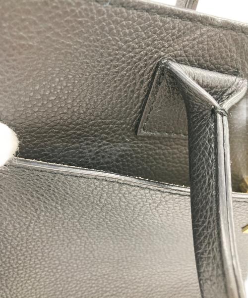 Manuel MILANO（マニュエルミラノ）Manuel MILANO (マニュエルミラノ) IENA (イエナ) 23AW 別注ゴールドモチーフバッグ ブラックの古着・服飾アイテム