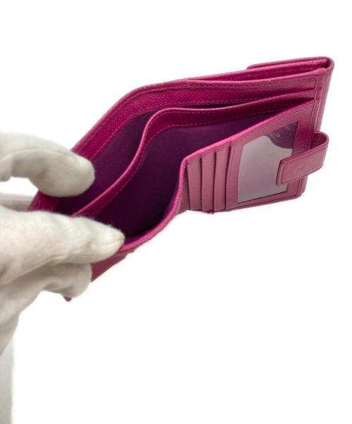 Salvatore Ferragamo（サルヴァトーレ フェラガモ）Salvatore Ferragamo (サルヴァトーレ フェラガモ) ガンチーニ レザー折り畳み財布 ピンクの古着・服飾アイテム