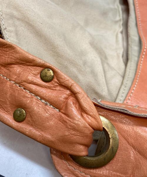 karosse（カロッセ）karosse (カロッセ) レザーバッグ オレンジの古着・服飾アイテム