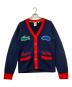 LACOSTE（ラコステ）の古着「COOLCATSセーター」｜ネイビー