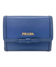PRADA（プラダ）の古着「ロゴプレートサフィアーノコンパクトウォレット」｜ブルー