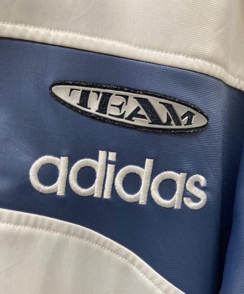 adidas（アディダス）adidas (アディダス) 古着 ロゴ刺繍トラックジャケット ホワイト×ブルー サイズ:Freeの古着・服飾アイテム