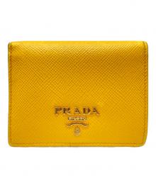 PRADA（プラダ）の古着「サフィアーノ2つ折り財布」｜イエロー