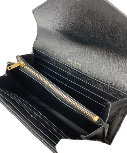 Yves Saint Laurent（イヴサンローラン）Yves Saint Laurent (イヴサンローラン) カサンドラ YSLロゴフラップロングウォレット ブラックの古着・服飾アイテム