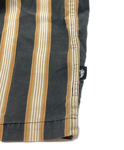 stussy（ステューシー）stussy (ステューシー) Cove Striped stussy shirt/コープ ストライプド ステューシー シャツ ブラック×オレンジ サイズ:Mの古着・服飾アイテム