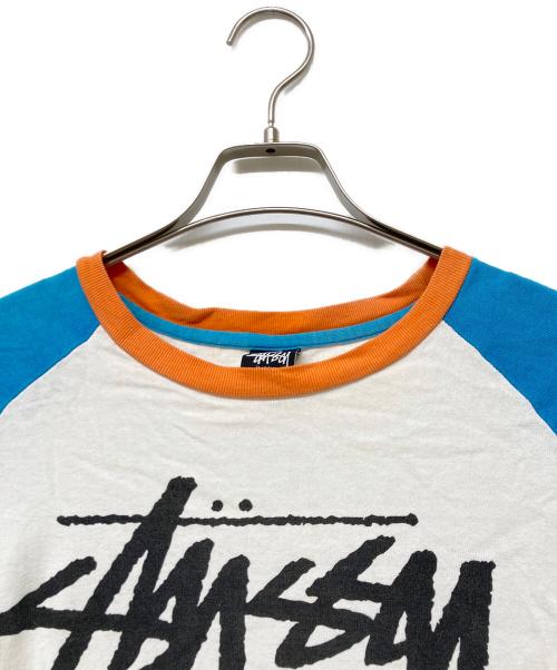 stussy（ステューシー）stussy (ステューシー) ラグランカットソー ブルー×ホワイト サイズ:SIZEMの古着・服飾アイテム