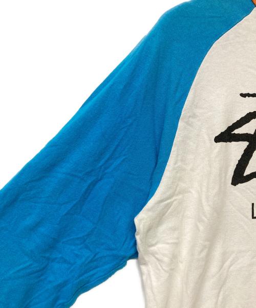 stussy（ステューシー）stussy (ステューシー) ラグランカットソー ブルー×ホワイト サイズ:SIZEMの古着・服飾アイテム