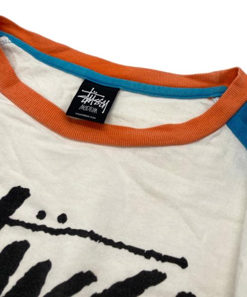 stussy（ステューシー）stussy (ステューシー) ラグランカットソー ブルー×ホワイト サイズ:SIZEMの古着・服飾アイテム
