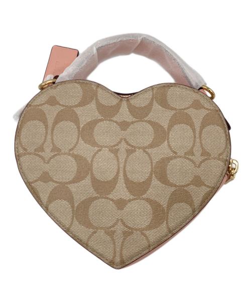COACH（コーチ）COACH (コーチ) ハート クロスボディ シグネチャー キャンバス チェリー プリント ショルダーバッグ ピンクの古着・服飾アイテム