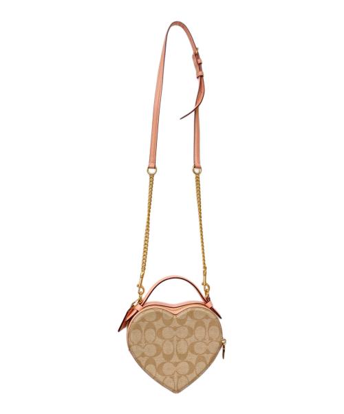 COACH（コーチ）COACH (コーチ) ハート クロスボディ シグネチャー キャンバス チェリー プリント ショルダーバッグ ピンクの古着・服飾アイテム