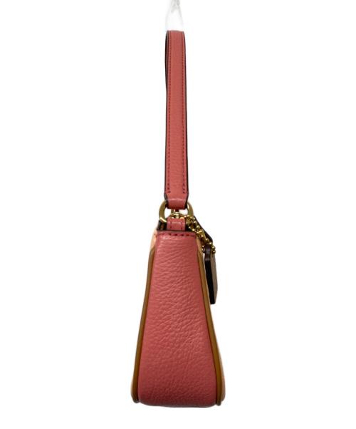 COACH（コーチ）COACH (コーチ) ノリータ 19 ホース＆キャリッジ リストレットポーチ ピンクの古着・服飾アイテム