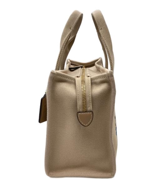 COACH（コーチ）COACH (コーチ) PEANUTS (ピーナッツ) Cargo Tote 26(カーゴ トート 26) ベージュの古着・服飾アイテム