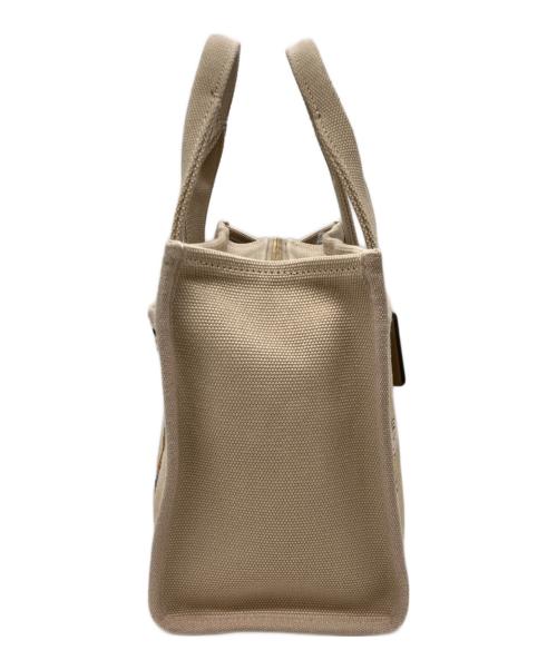 COACH（コーチ）COACH (コーチ) PEANUTS (ピーナッツ) Cargo Tote 26(カーゴ トート 26) ベージュの古着・服飾アイテム