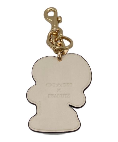 COACH（コーチ）COACH (コーチ) PEANUTS (ピーナッツ) スヌーピー バッグチャーム ホワイトの古着・服飾アイテム