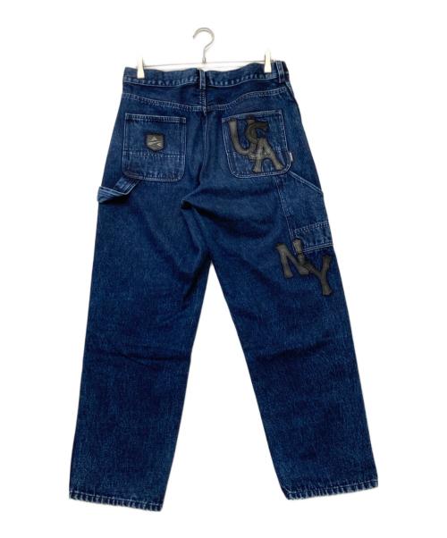 AVIREX（アヴィレックス）AVIREX (アヴィレックス) LEATHER PATCH DENIM PANTS(レザー パッチ デニム パンツ) インディゴ サイズ:SIZELの古着・服飾アイテム
