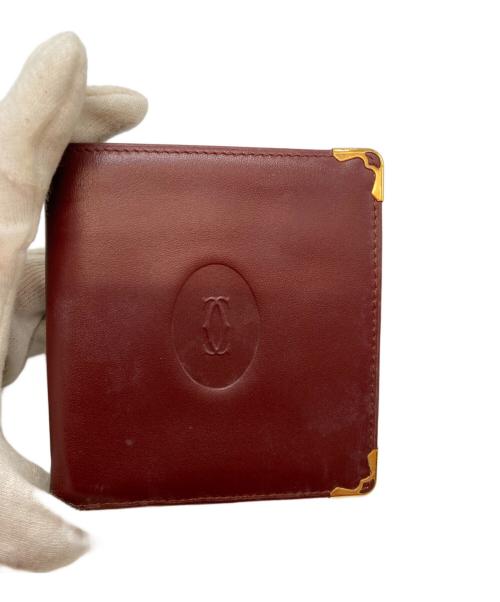 Cartier（カルティエ）Cartier (カルティエ) マストドゥカルティエ 2つ折り財布 ボルドーの古着・服飾アイテム